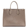Louis Vuitton Tourterelle Monogram Giant Empreinte Onthego MM - Love that Bag etc - Preowned Authentic Designer Handbags & Preloved Fashions