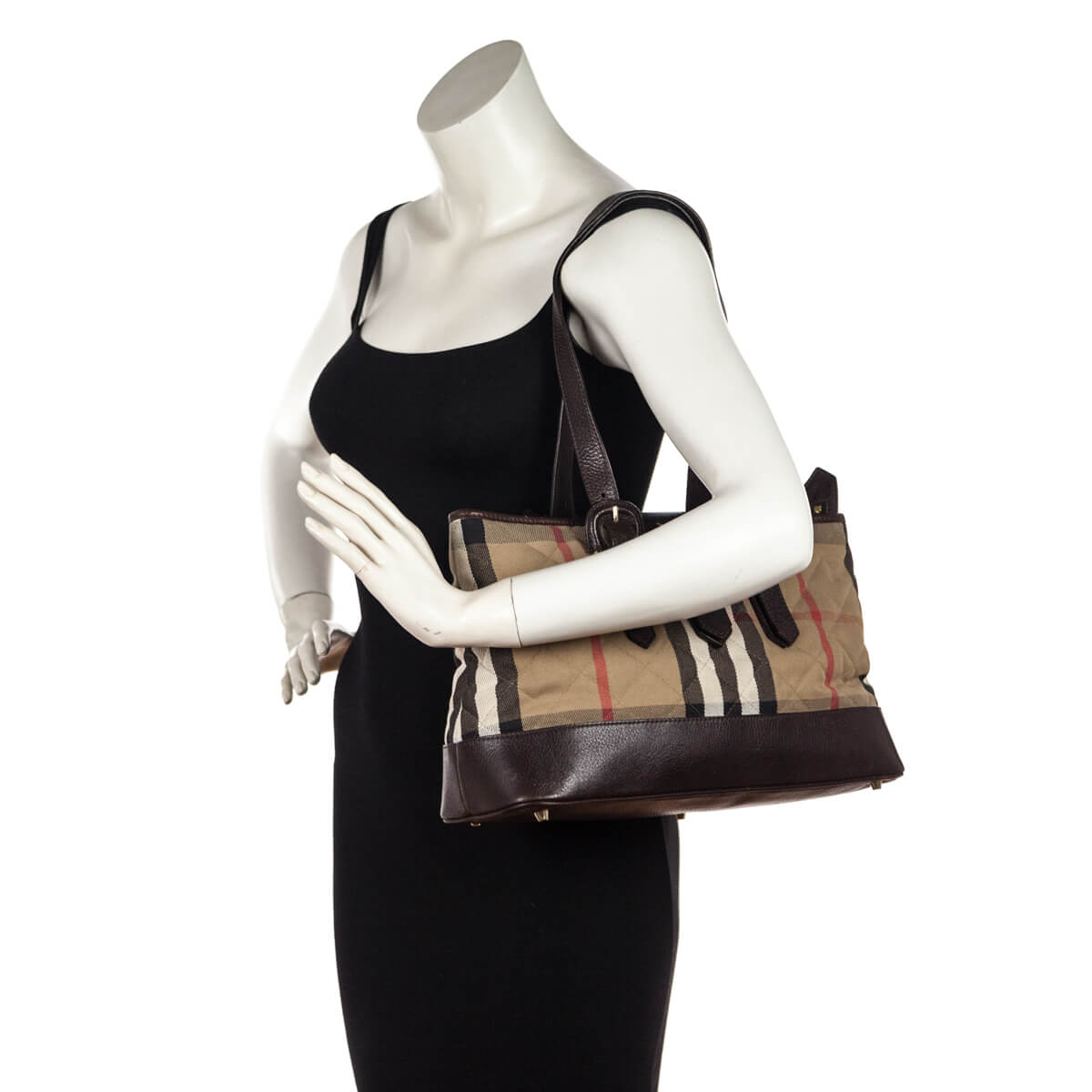 This chic hobo is crafted of classic Burberry Nova check canvas.