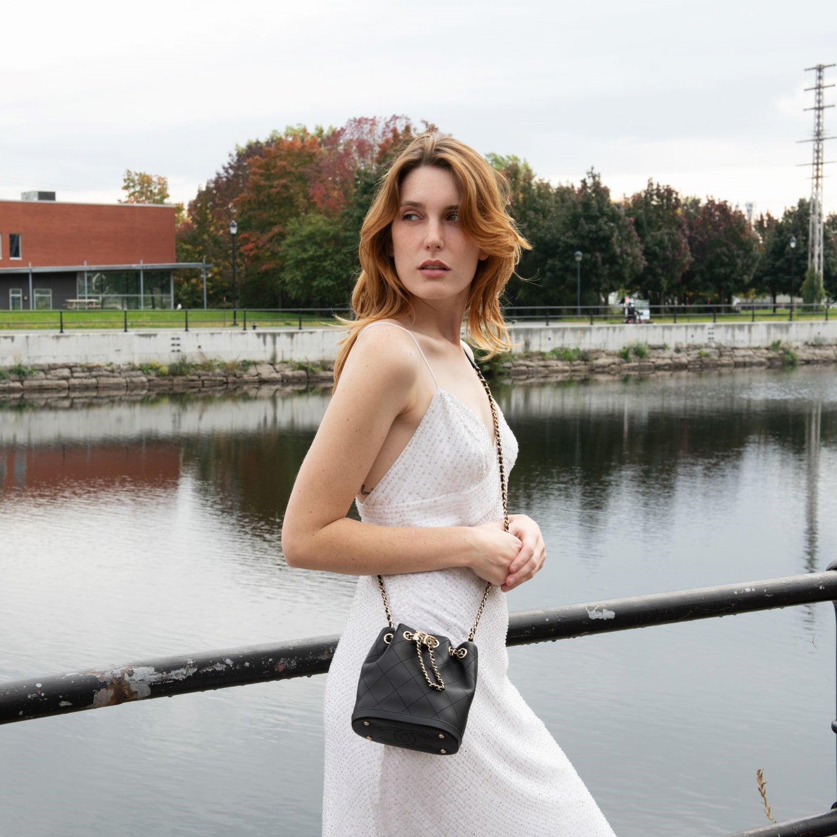 Chanel Black Stitched Calfskin Mini Drawstring Bag GHW – Love that Bag etc  - Preowned Designer Fashions