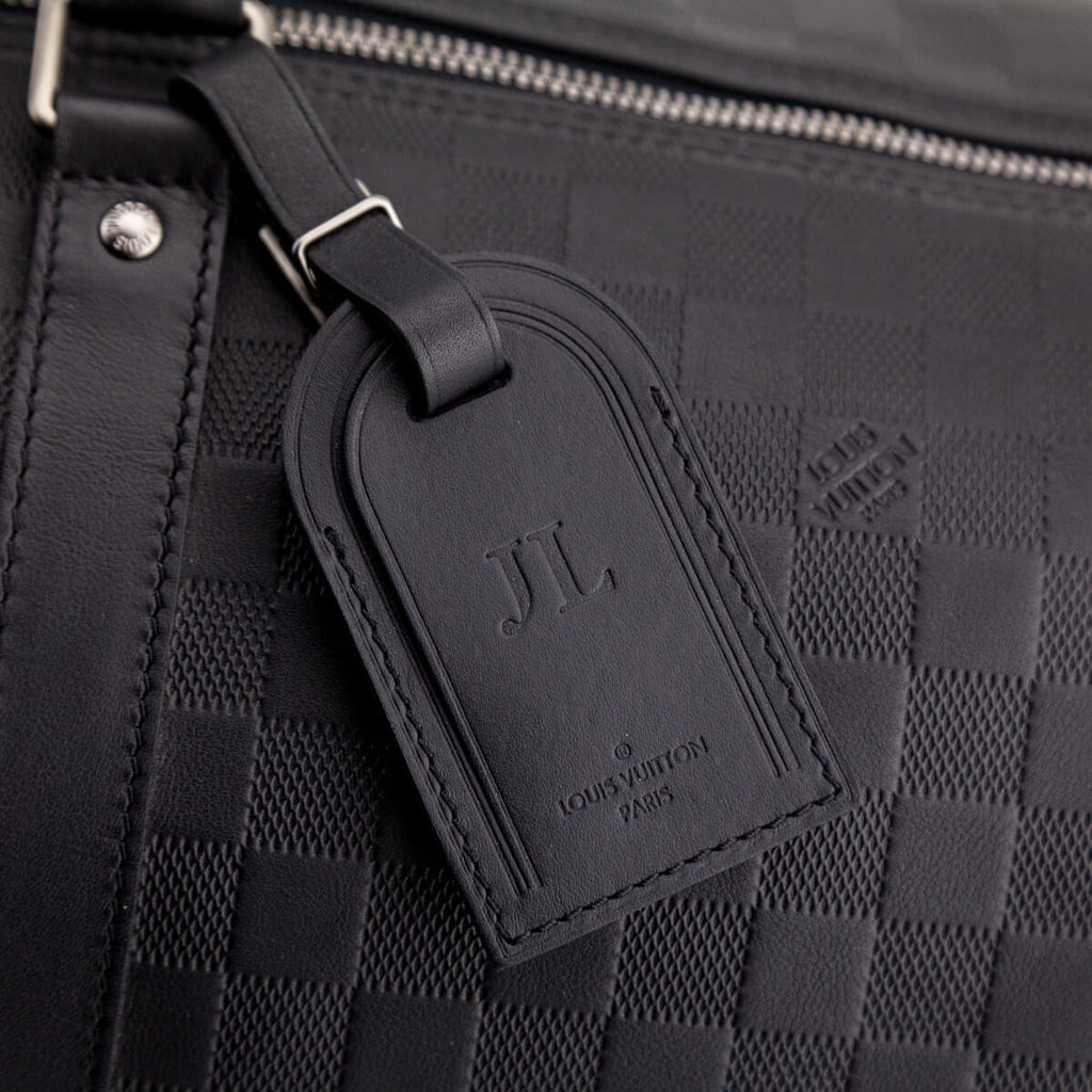infini leather keepall bandouliere 55